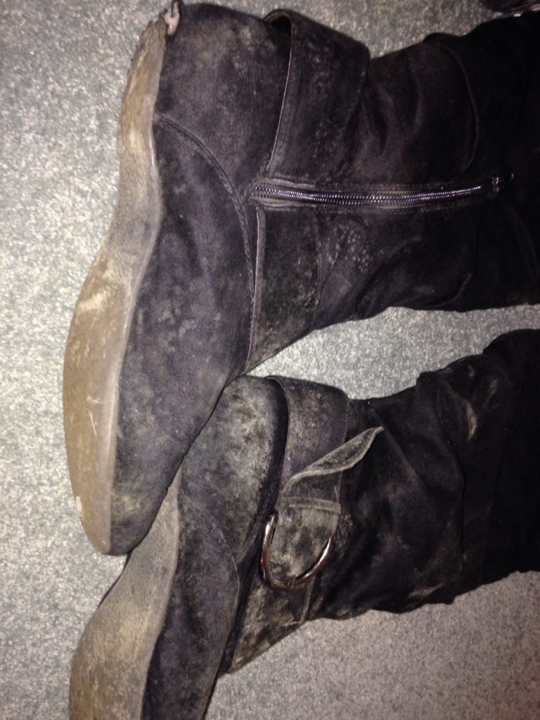 black mould growing on leather boots